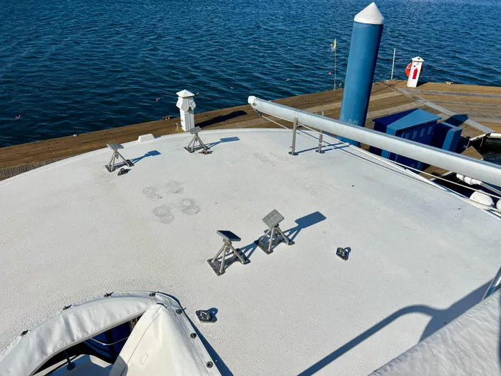  Yacht Photos Pics Rooftop of 2008 Island Pilot 435 yacht docked by the water.