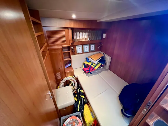  Yacht Photos Pics Cozy cabin interior of 2008 Island Pilot 435 with storage and seating.