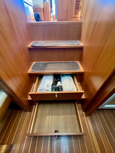  Yacht Photos Pics Staircase with storage drawers on 2008 Island Pilot 435 yacht.
