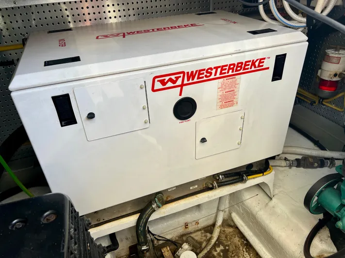  Yacht Photos Pics Westerbeke generator in 2008 Island Pilot 435 engine room, showcasing marine equipment.