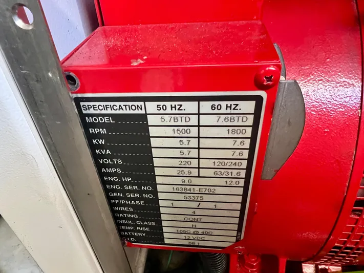  Yacht Photos Pics Engine specifications label on a red Island Pilot 435, 2008 model.