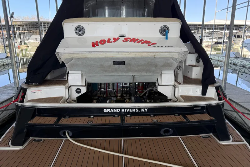  Yacht Photos Pics 2012 Regal 46 Sport Coupe boat docked, rear view with "Holy Ship!" text, Grand Rivers, KY.