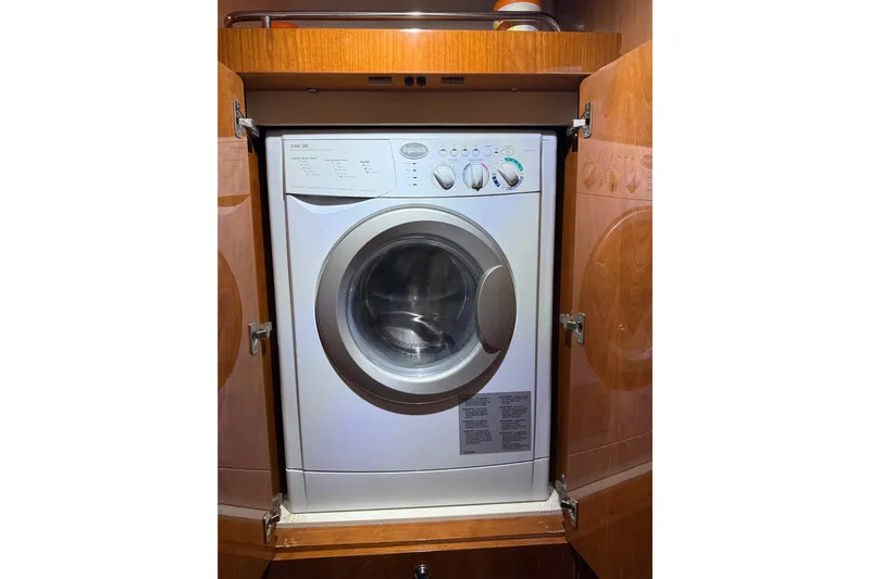  Yacht Photos Pics Built-in washing machine inside a 2012 Regal 46 Sport Coupe yacht cabinet.