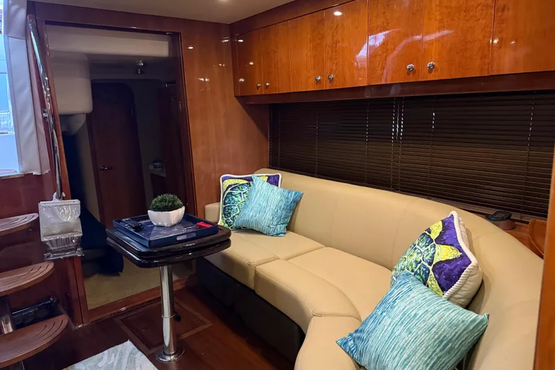  Yacht Photos Pics Luxurious interior of 2012 Regal 46 Sport Coupe with elegant seating and decor.