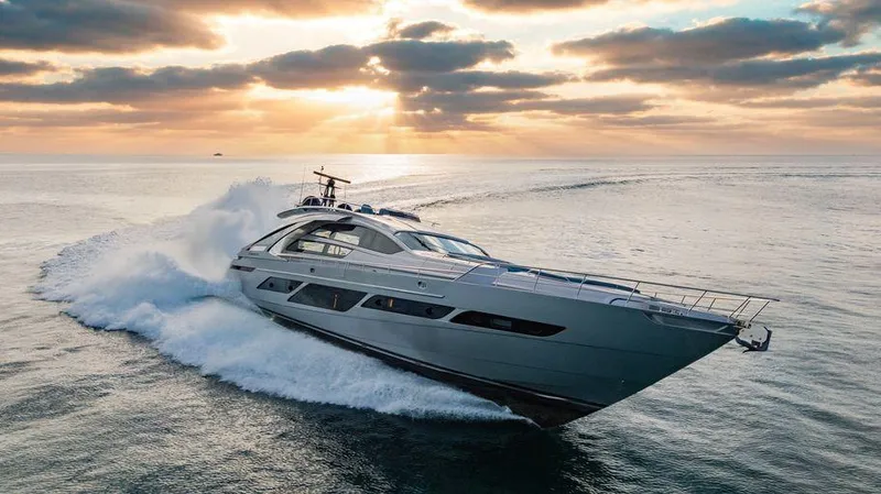 Vintage Yacht Photos Pics 2021 Pershing 9X yacht cruising at sunset on open sea.