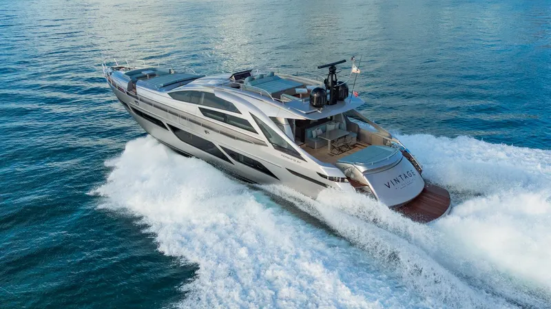 Vintage Yacht Photos Pics 2021 Pershing 9X yacht cruising on open water, showcasing sleek design and luxury.