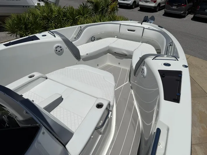  Yacht Photos Pics 2025 Wellcraft 38 T-Top boat interior with white seating and modern design.