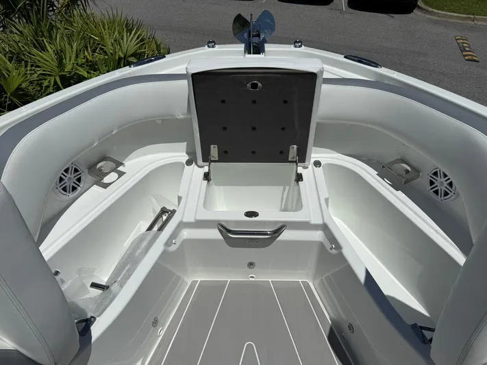  Yacht Photos Pics 2025 Wellcraft 38 T-Top boat interior with open storage compartments and sleek seating.