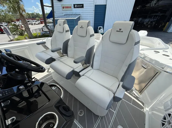  Yacht Photos Pics 2025 Wellcraft 38 T-Top boat interior with three luxury captain's chairs.