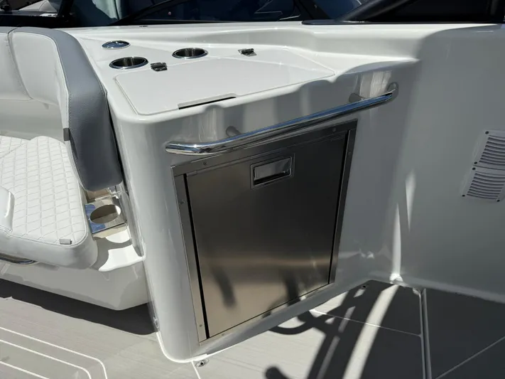  Yacht Photos Pics 2025 Wellcraft 38 T-Top boat interior with stainless steel storage and seating.