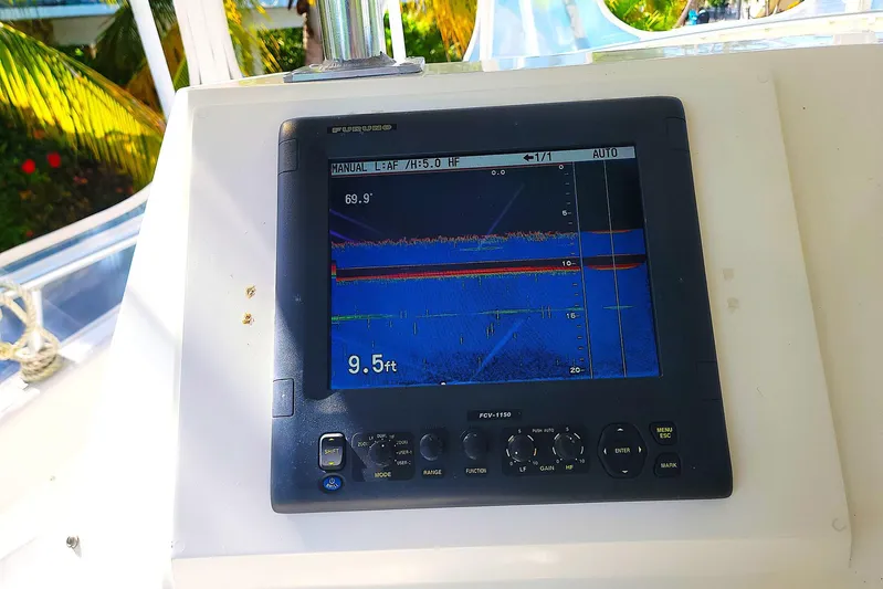 Trophy Hunter Yacht Photos Pics Fishfinder display on a 1989 Bertram 50 Convertible boat, showing depth and sonar readings.