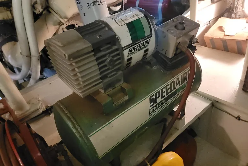 Trophy Hunter Yacht Photos Pics Speedaire air compressor in 1989 Bertram 50 Convertible engine room.