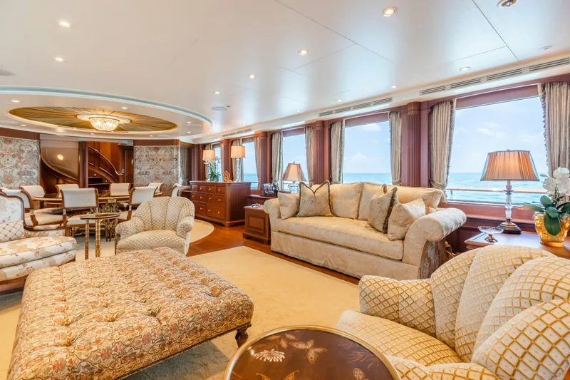Shadowl Yacht Photos Pics Luxurious yacht interior with elegant furnishings, large windows, and ocean view. Burger Custom 2010 model.