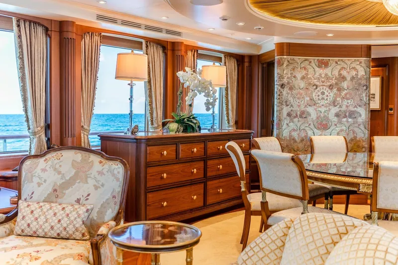 Shadowl Yacht Photos Pics Luxurious yacht interior with elegant furnishings, ocean view, and ornate decor. Burger Custom 2010.