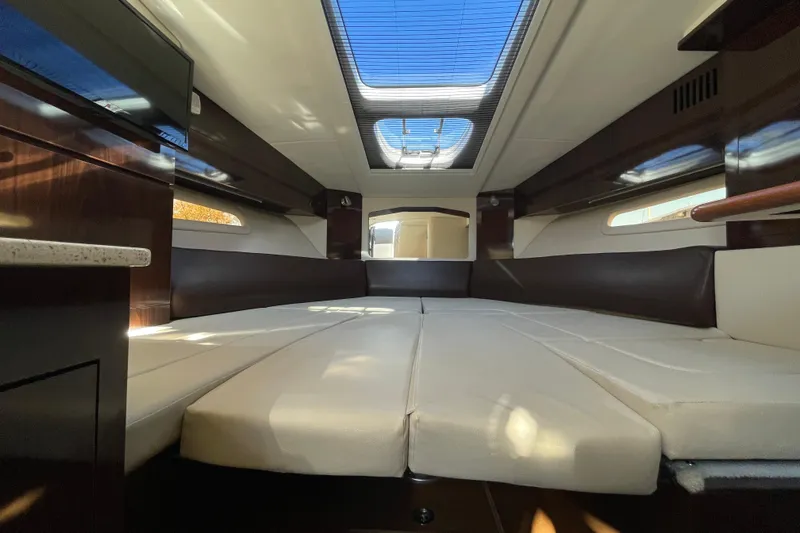  Yacht Photos Pics Interior of 2016 Sea Ray 310 Sundancer yacht with spacious seating and skylight.