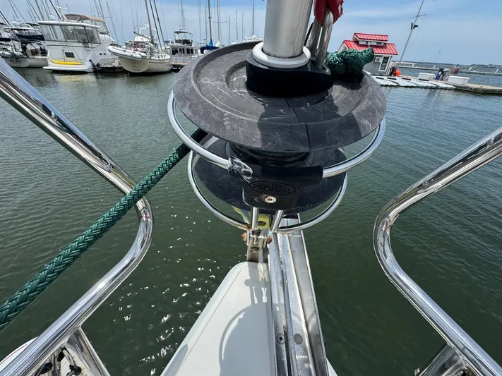 Layover Yacht Photos Pics Bow view of 2018 Jeanneau Sun Odyssey 389 sailboat in marina.
