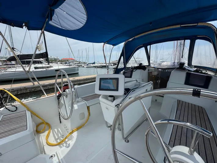 Layover Yacht Photos Pics Cockpit view of 2018 Jeanneau Sun Odyssey 389 sailboat docked at marina.