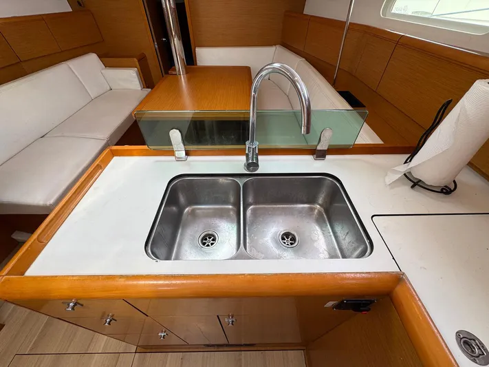 Layover Yacht Photos Pics Interior of 2018 Jeanneau Sun Odyssey 389 yacht, featuring a modern kitchen sink.