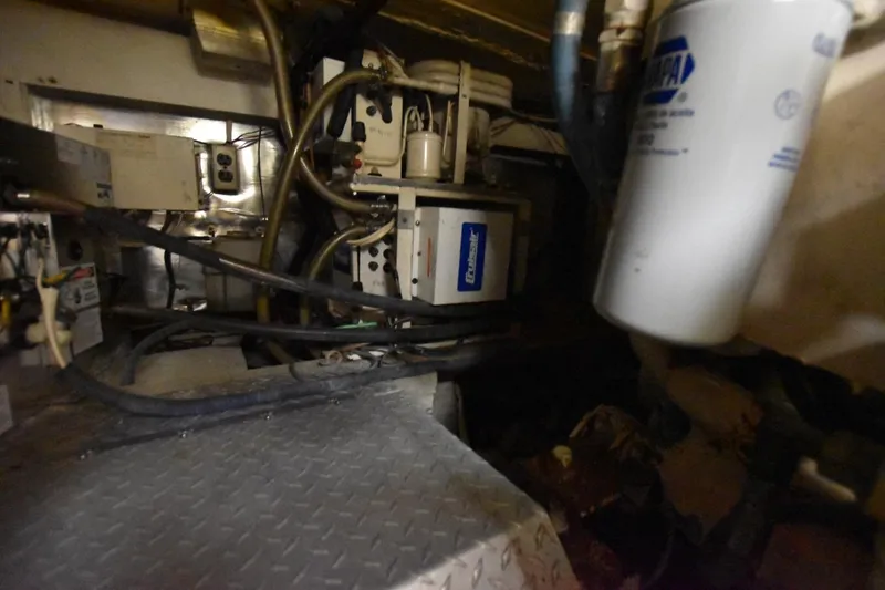 My Love Yacht Photos Pics Engine room of 1993 Ocean Yachts 44 Aft Cabin with mechanical components and wiring.