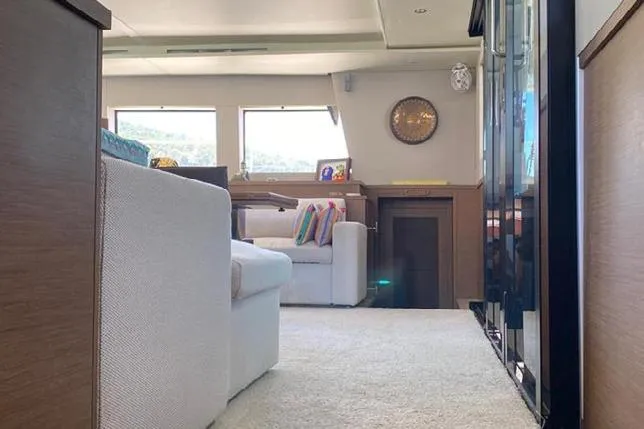  Yacht Photos Pics Luxurious interior of 2019 Lagoon 630 Motor Yacht with modern furnishings and decor.