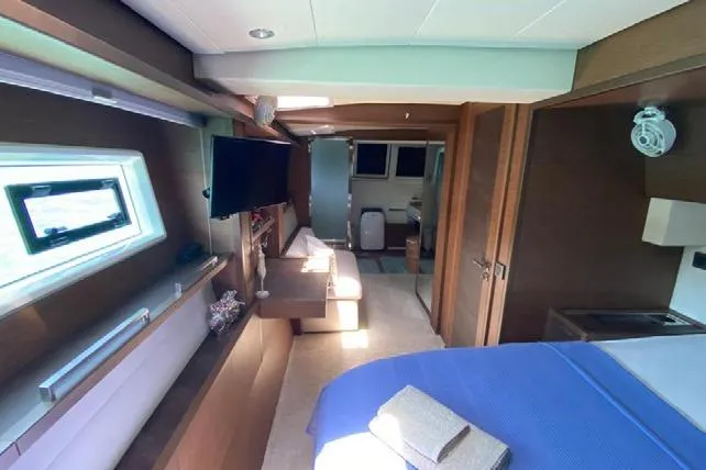  Yacht Photos Pics Luxurious interior of 2019 Lagoon 630 Motor Yacht with modern amenities and elegant design.