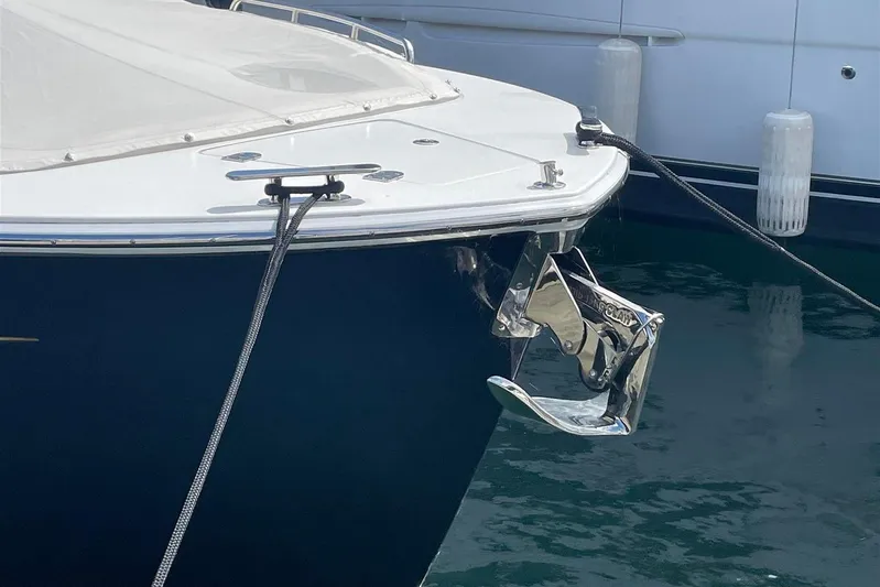 O-m-g Yacht Photos Pics Bow of 2023 MJM 3 boat with anchor and mooring lines in marina.