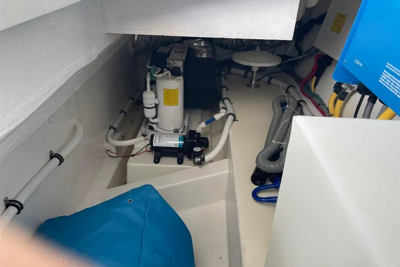 O-m-g Yacht Photos Pics Engine compartment of 2023 MJM 3 boat, showcasing mechanical components and wiring.