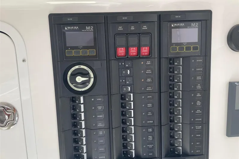 O-m-g Yacht Photos Pics Control panel of 2023 MJM 3 boat featuring Blue Sea Systems M2 displays.