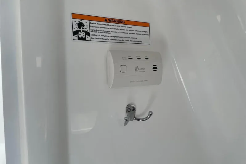 O-m-g Yacht Photos Pics Carbon monoxide alarm and warning label inside 2023 MJM Model 3 boat.