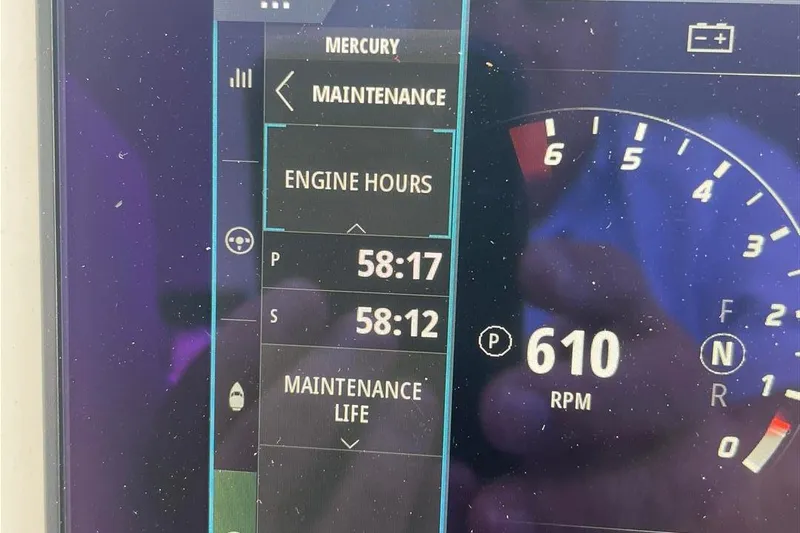 O-m-g Yacht Photos Pics Dashboard display of MJM 3, 2023 model showing engine hours and RPM.