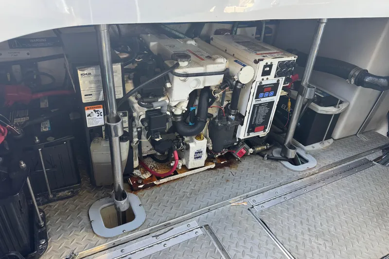  Yacht Photos Pics Engine compartment of a 2006 Formula 400 Super Sport boat, featuring Kohler power systems.