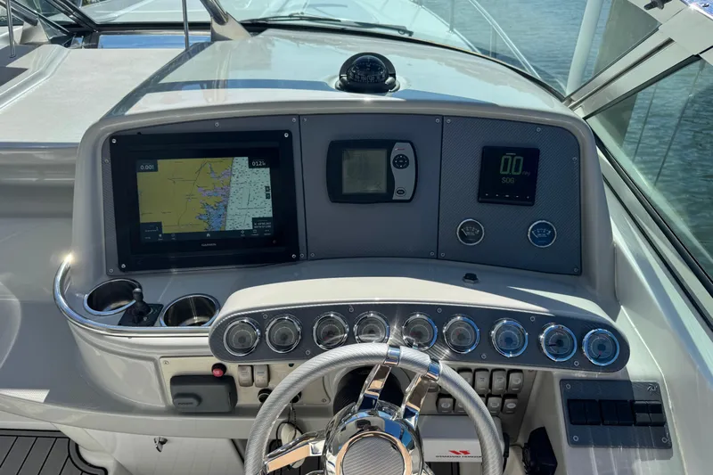  Yacht Photos Pics Dashboard of a 2006 Formula 400 Super Sport boat with navigation controls.