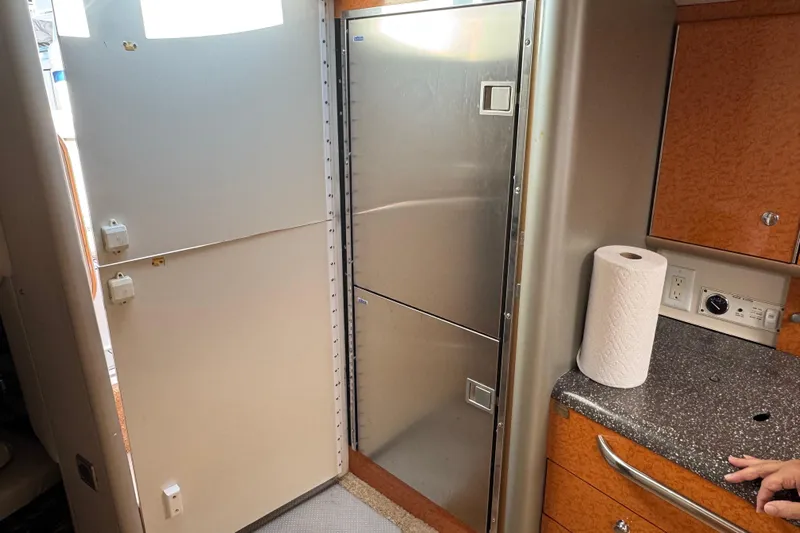  Yacht Photos Pics 2006 Formula 400 Super Sport yacht interior with stainless steel fridge and countertop.