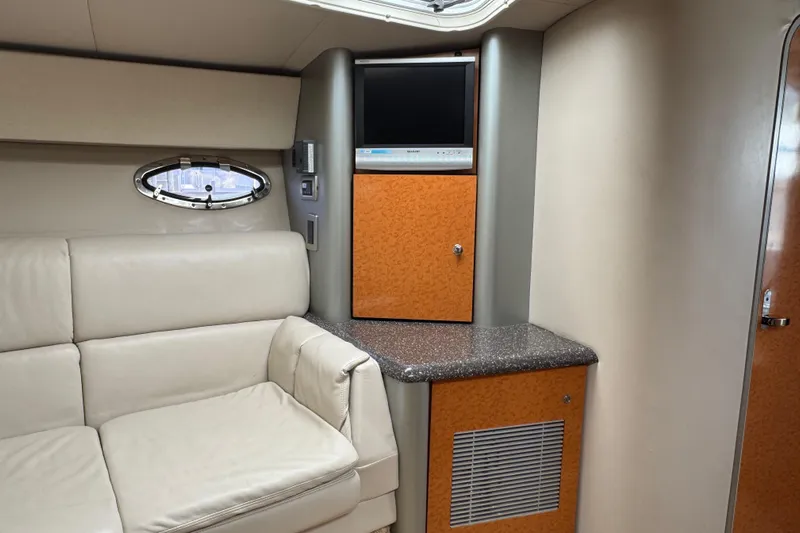  Yacht Photos Pics Interior of 2006 Formula 400 Super Sport yacht with beige seating and wood accents.