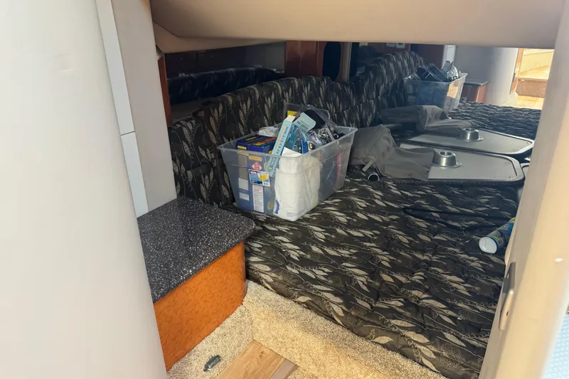  Yacht Photos Pics Interior of 2006 Formula 400 Super Sport boat with storage bins and patterned upholstery.