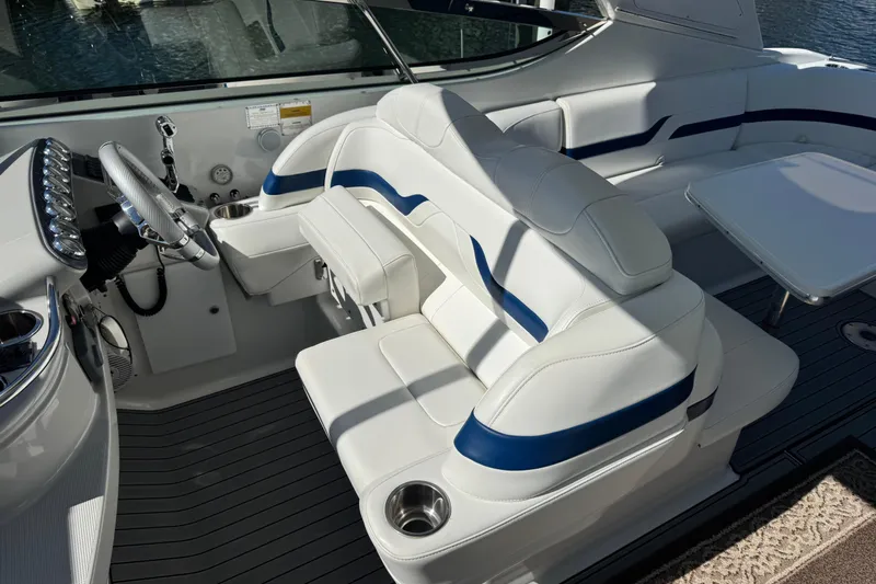  Yacht Photos Pics 2006 Formula 400 Super Sport boat interior with white and blue seating.