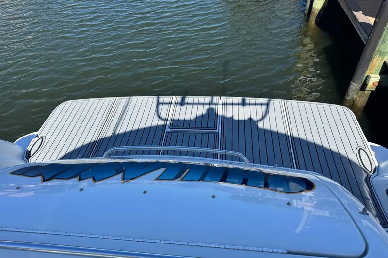  Yacht Photos Pics 2006 Formula 400 Super Sport boat deck overlooking calm marina waters.