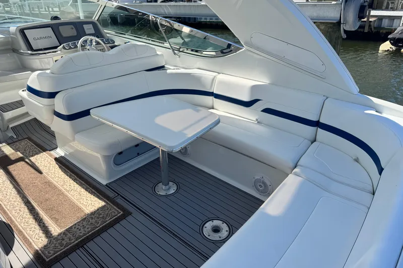  Yacht Photos Pics 2006 Formula 400 Super Sport yacht interior with white seating and table.