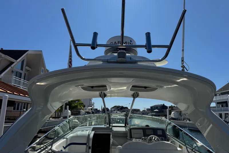  Yacht Photos Pics 2006 Formula 400 Super Sport yacht docked, showcasing sleek design and advanced navigation equipment.