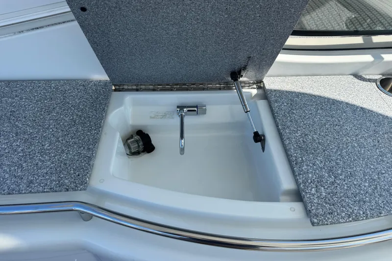  Yacht Photos Pics 2006 Formula 400 Super Sport boat sink with open cover and faucet.