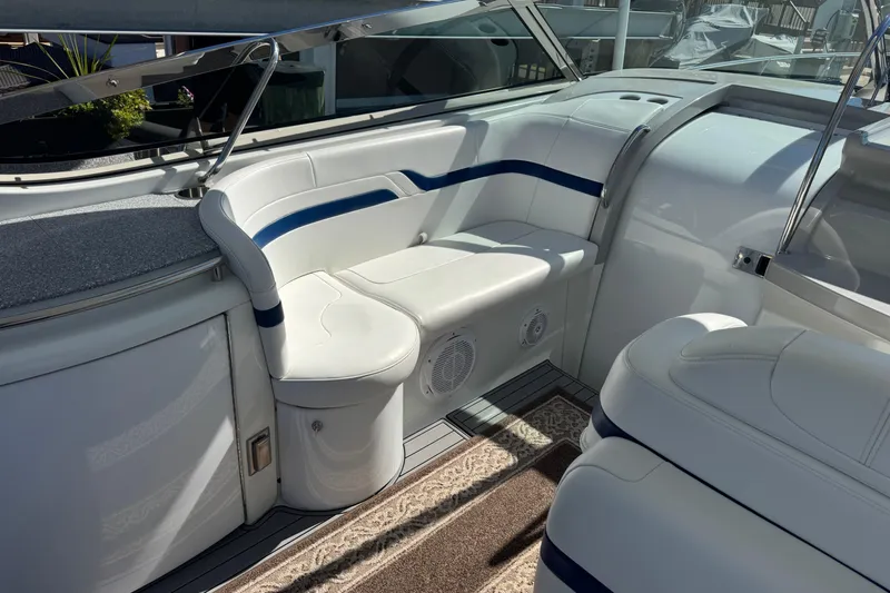  Yacht Photos Pics 2006 Formula 400 Super Sport boat interior with white seating and blue accents.