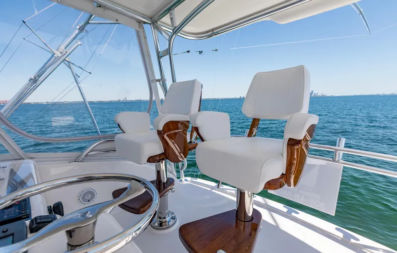  Yacht Photos Pics Luxury helm chairs on a 2007 Bertram 570 yacht, overlooking the ocean.