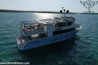 Luxurious 2024 Custom 29m Charter MY yacht cruising on serene blue waters.