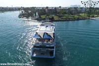 Luxurious 2024 Custom 29m Charter MY yacht cruising near a scenic coastline.