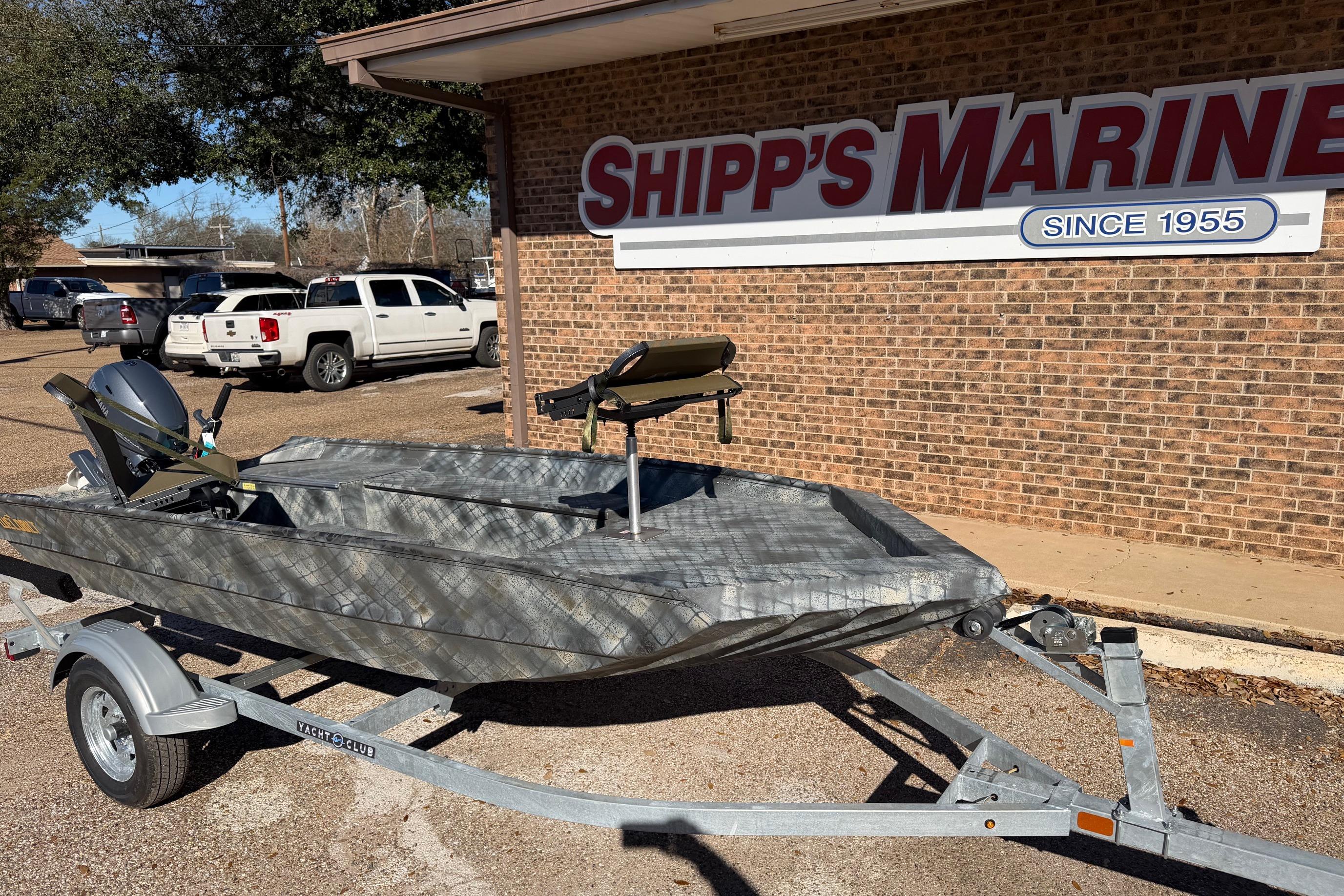 2025 WeldBilt 1448 boat on trailer outside Shipp's Marine store.