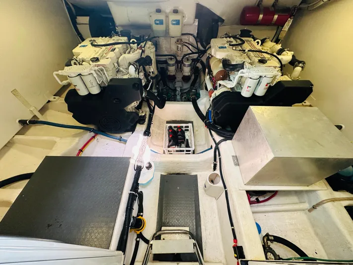 Slipped Away Yacht Photos Pics Engine room of 2008 Sabre 42 Hardtop Express with dual engines and equipment.