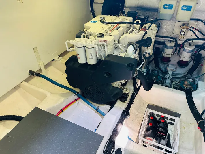 Slipped Away Yacht Photos Pics Engine room of 2008 Sabre 42 Hardtop Express with visible components and wiring.