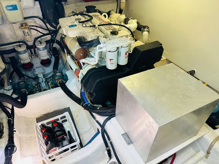 Slipped Away Yacht Photos Pics Engine room of 2008 Sabre 42 Hardtop Express with visible components and wiring.