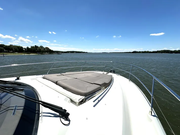  Yacht Photos Pics 2017 Prestige 500 yacht on calm waters under a clear blue sky.