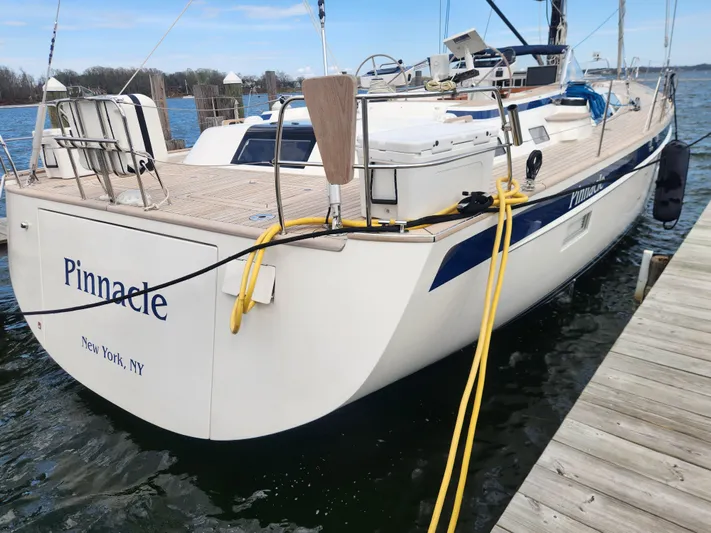 Pinnacle Yacht Photos Pics 2023 Hallberg-Rassy 57 sailboat docked, named "Pinnacle," New York, NY.